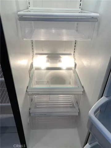 a view of livingroom and hardwood floor