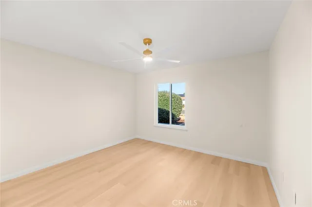 a bathroom with a shower and toilet