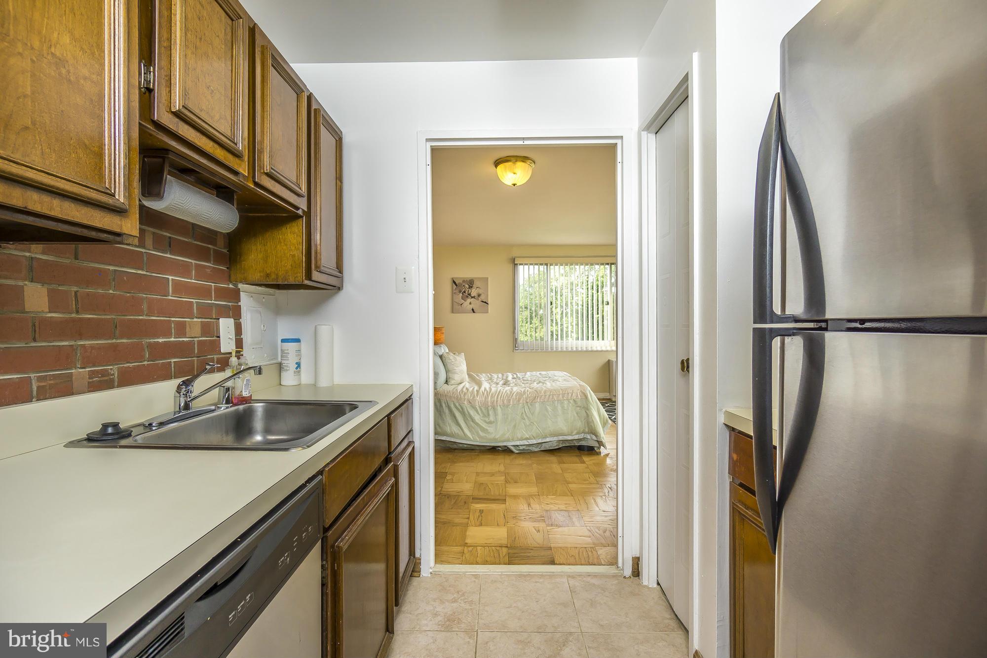1900 Lyttonsville Road, Unit 1101 Silver Spring, MD 20910 - Photo 10 of 30 Kitchen