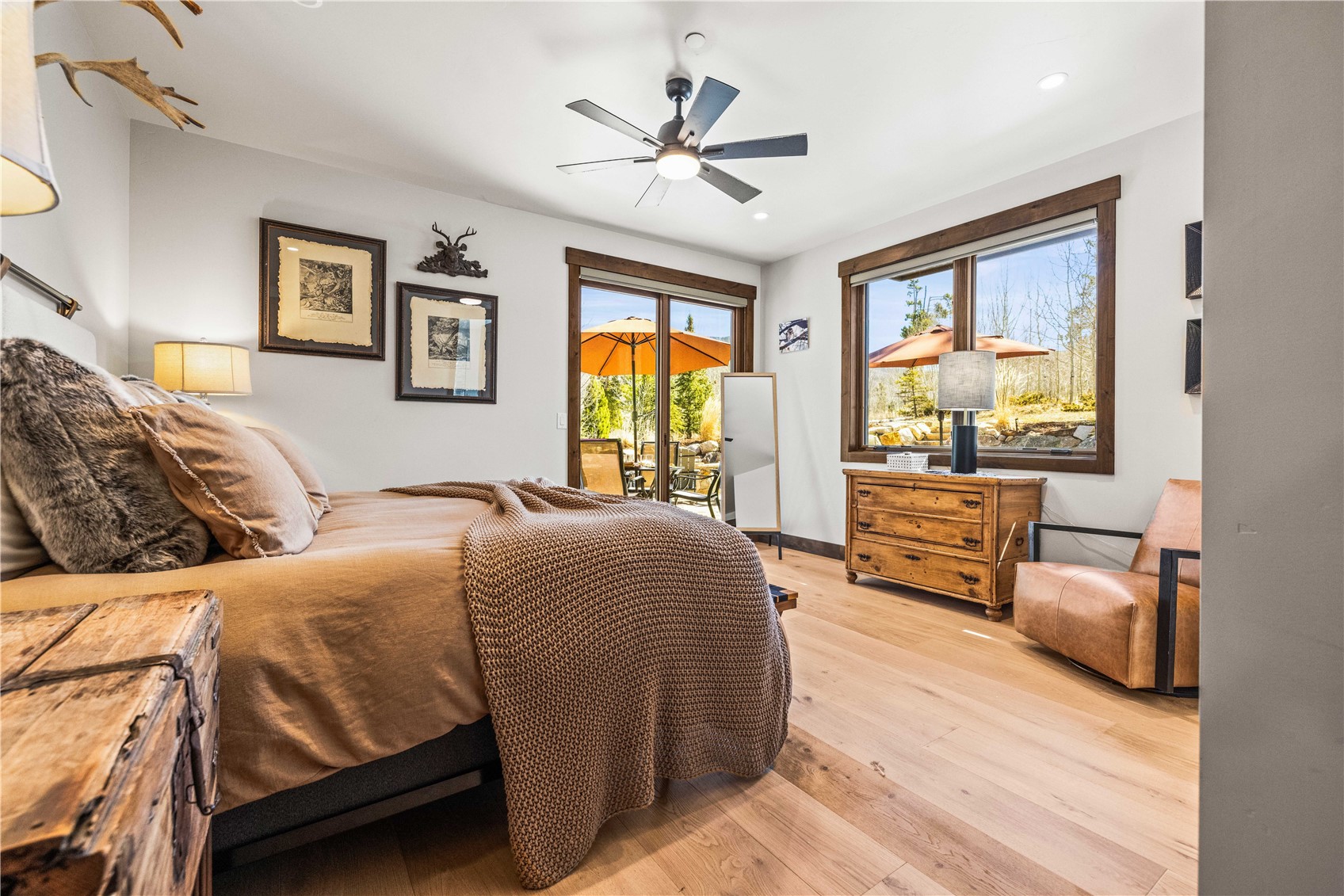 230 Game Trail Road Silverthorne, CO 80498 - Photo 26 of 43 a bedroom with a large bed and a couch