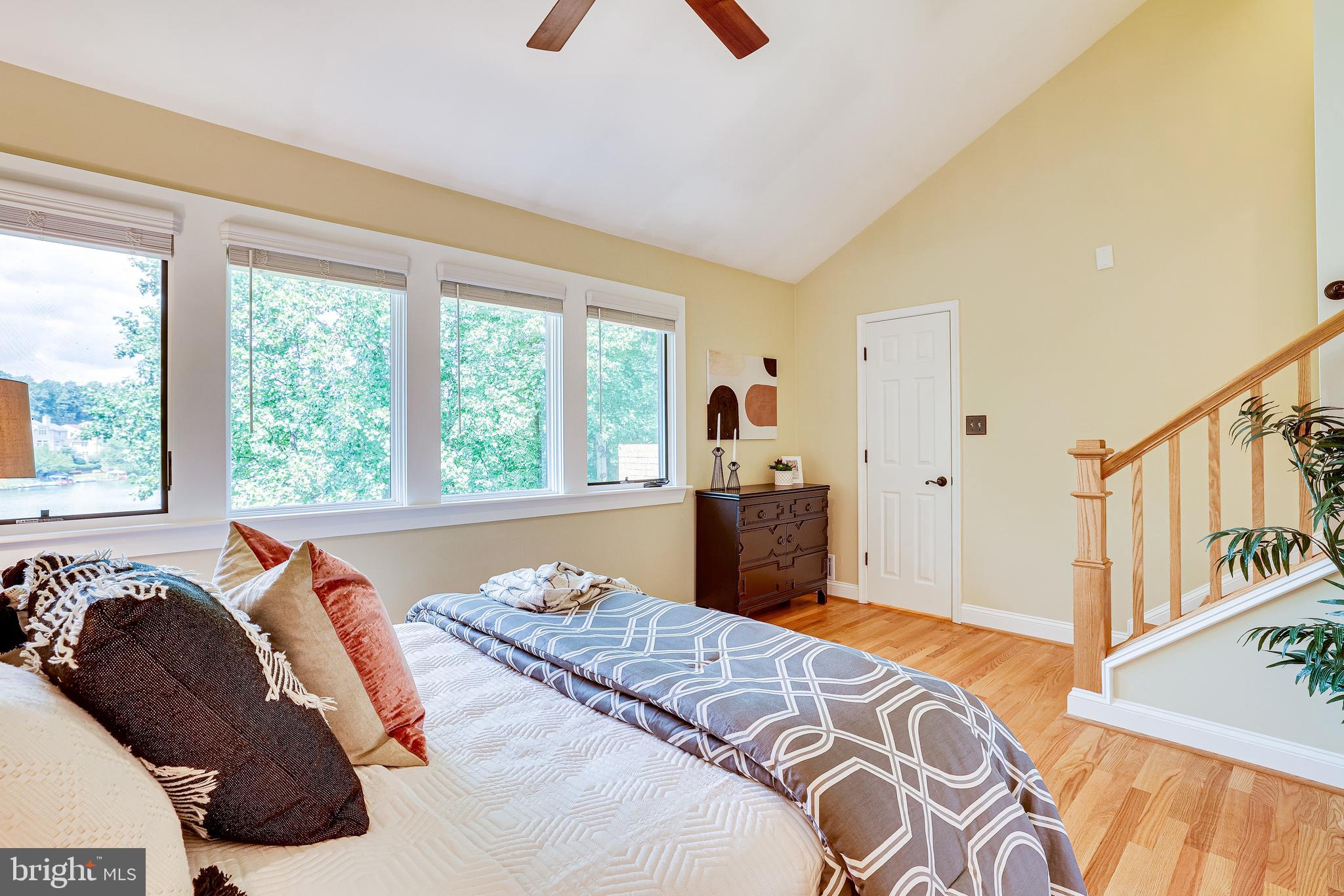 11056 Thrush Ridge Road Reston, VA 20191 - Photo 29 of 62 a bed room with a bed and a large window