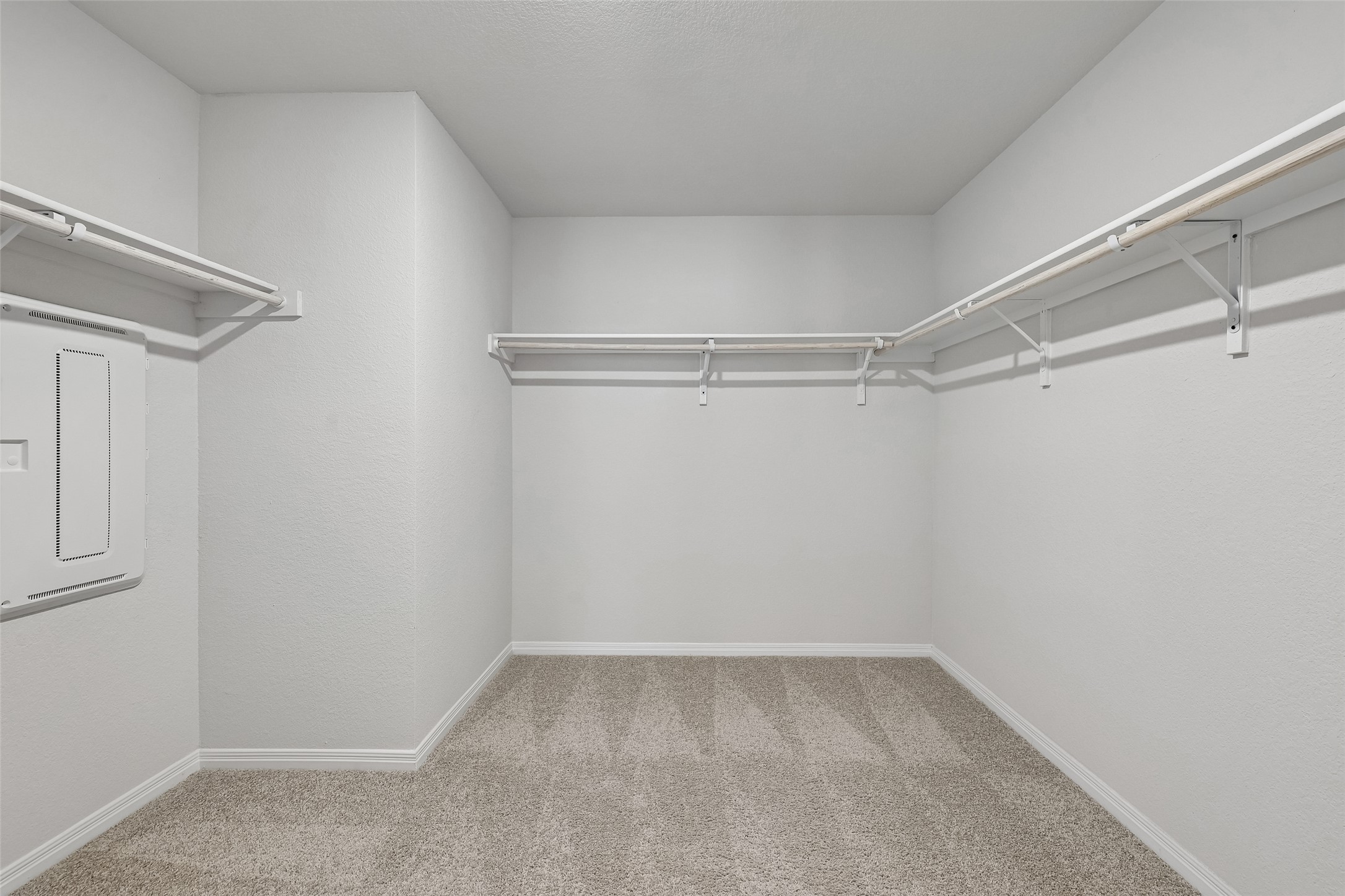 19805 Abigail Fillmore Road Manor, TX 78653 - Photo 20 of 40 Ample shelving and hanging space defines this generously sized walk-in closet.