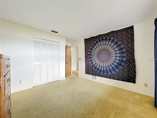 a view of a house with a big yard