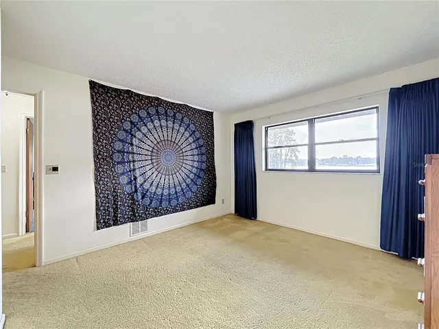 a view of a house with a big yard