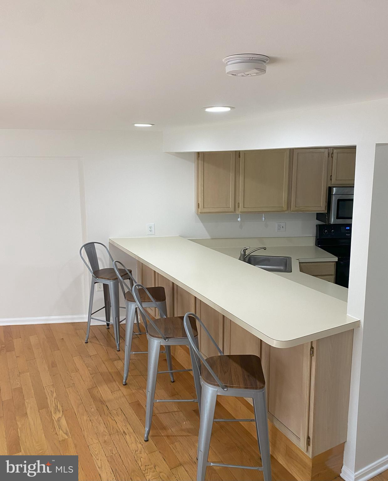 3436 Littleleaf Place Laurel, MD 20724 - Photo 4 of 18 a kitchen with a table and chairs