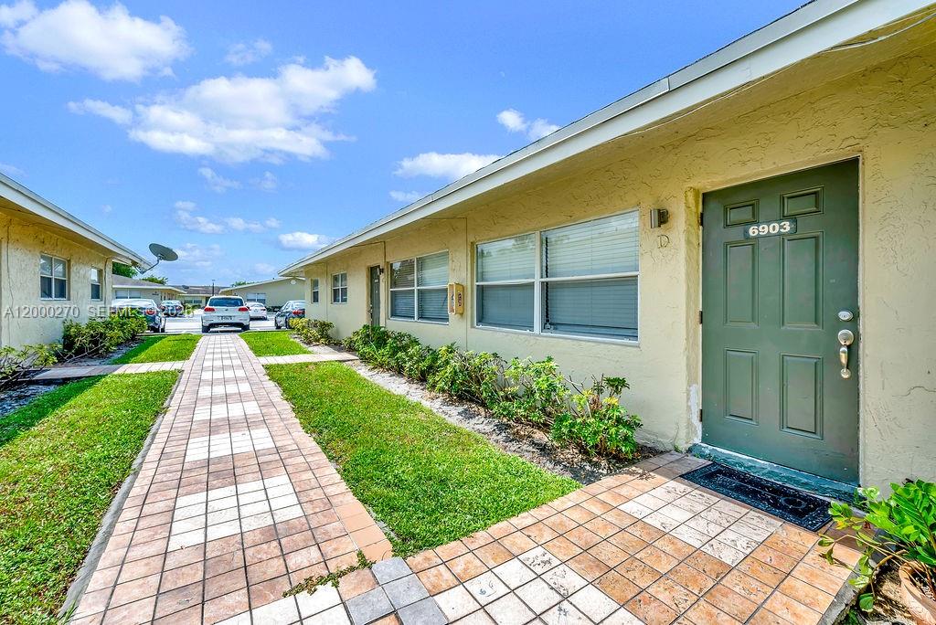 6951 Southwest 7th Street Margate, FL 33068 - Photo 26 of 45 a view of house with garden