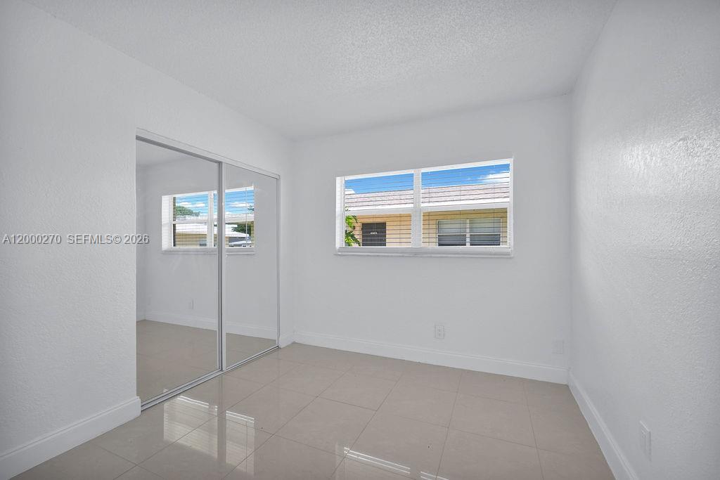 6951 Southwest 7th Street Margate, FL 33068 - Photo 4 of 45 a view of an empty room