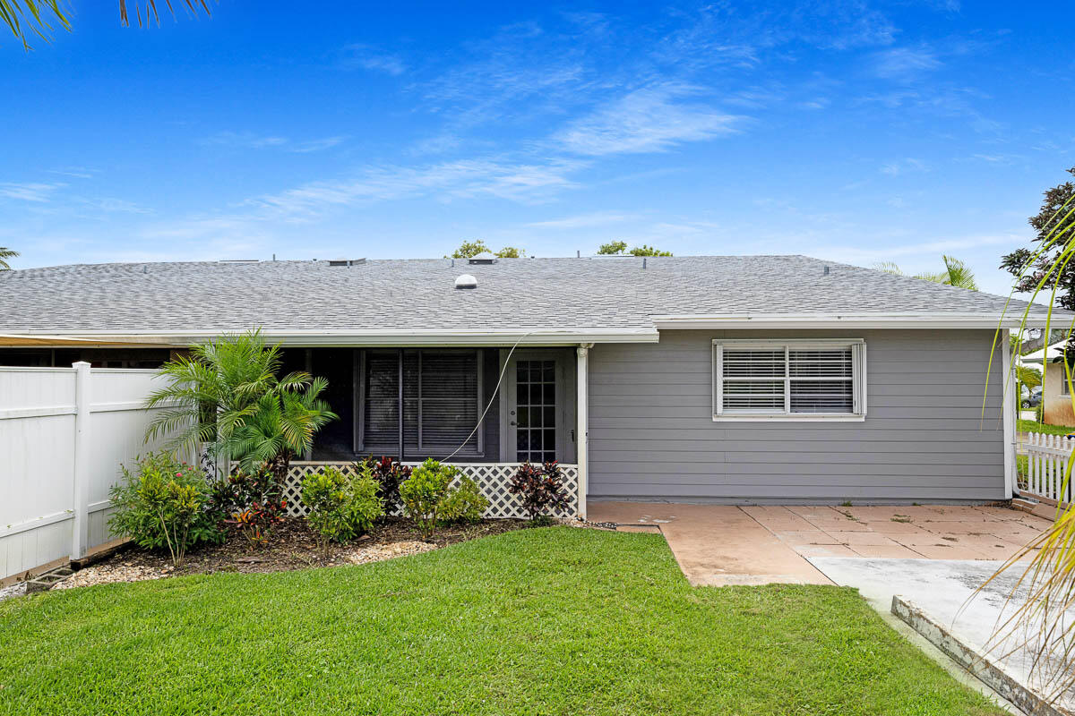 9015 Southeast Hobe Ridge Avenue Hobe Sound, FL 33455 - Photo 1 of 18 9015 Villa Front