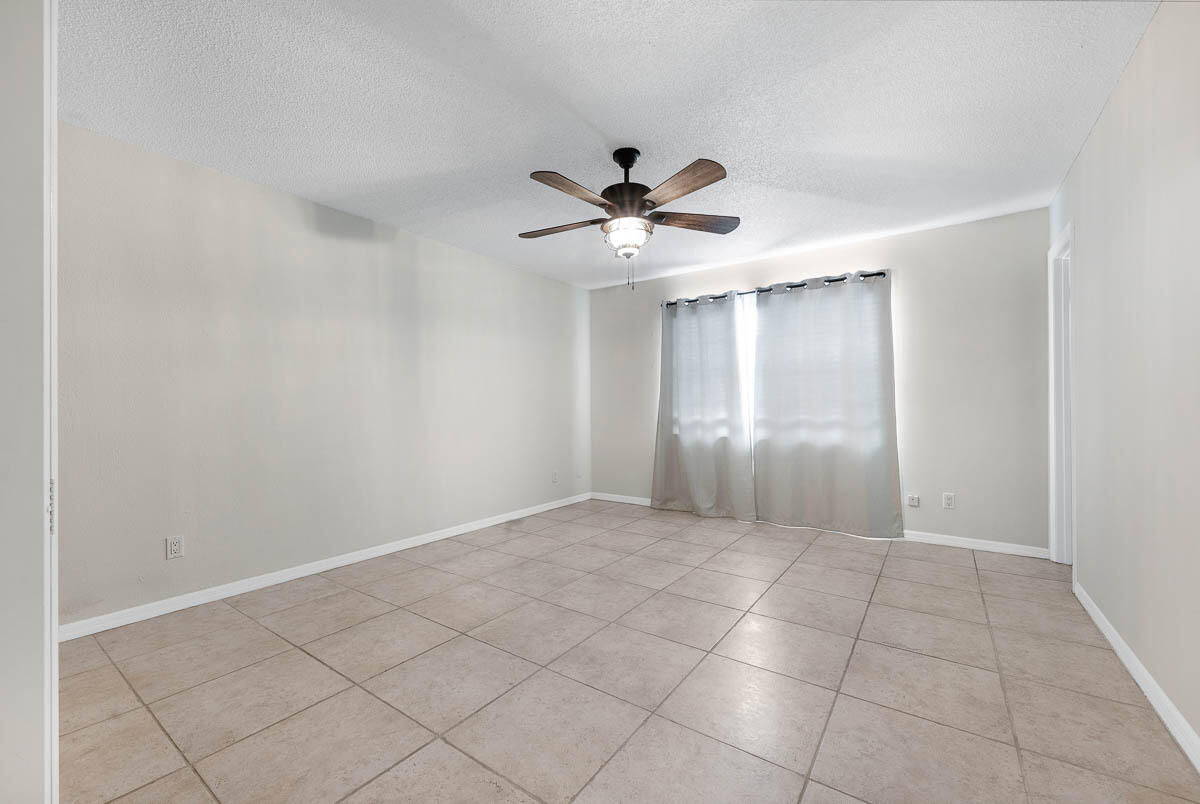 9015 Southeast Hobe Ridge Avenue Hobe Sound, FL 33455 - Photo 13 of 18 Master Bedroom