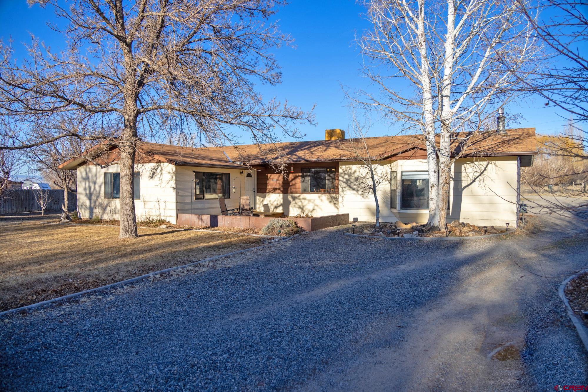 11500 6250th Road Montrose, CO 81401 - Photo 1 of 35 a view of a house with a yard