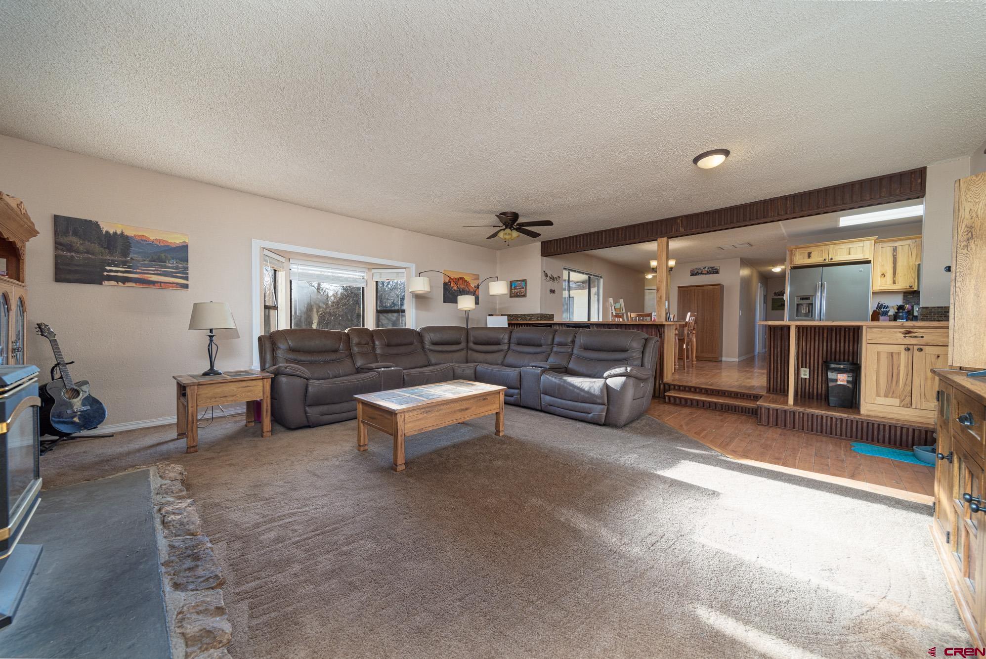 11500 6250th Road Montrose, CO 81401 - Photo 12 of 35 a living room with furniture and a couch
