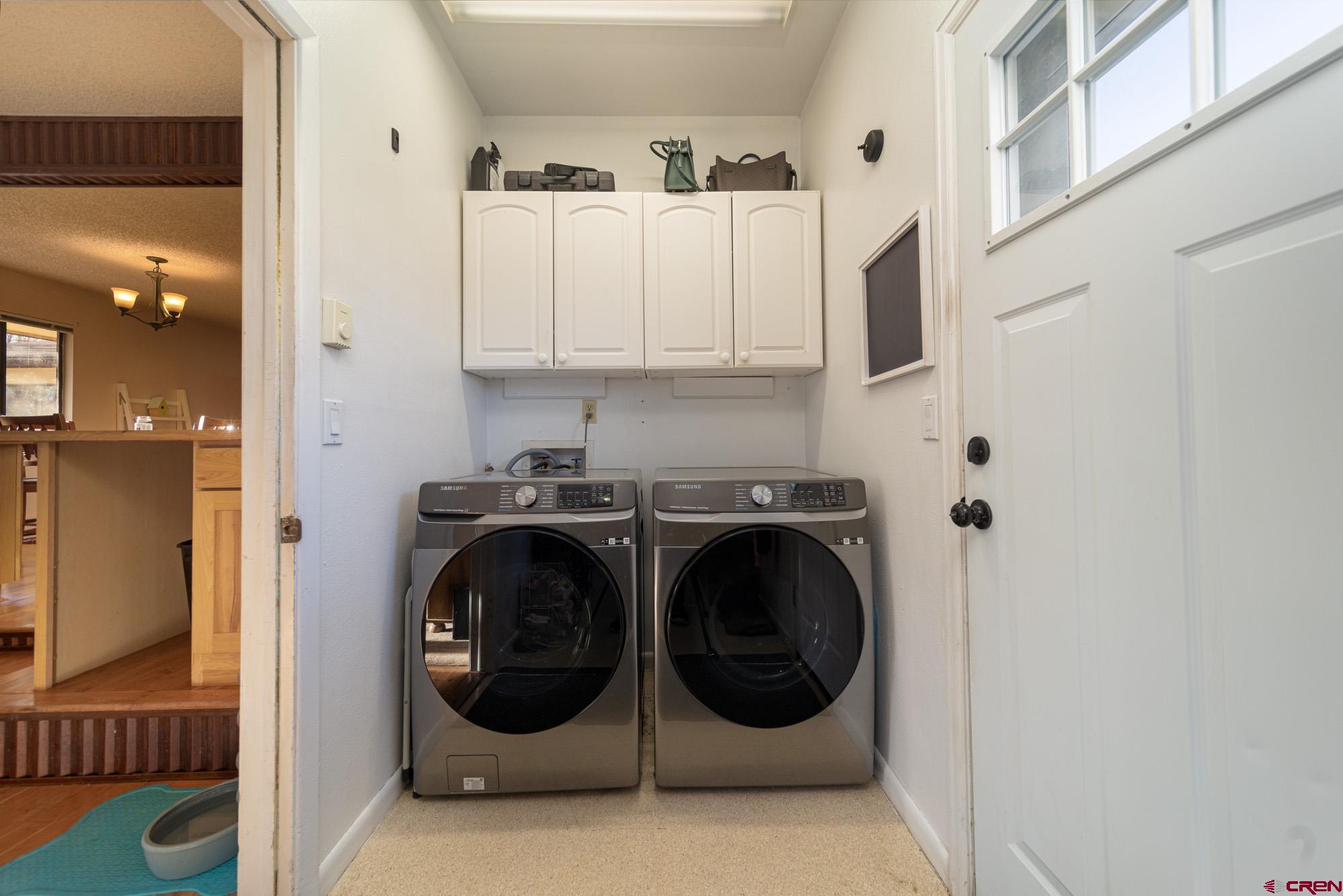 11500 6250th Road Montrose, CO 81401 - Photo 29 of 35 a utility room with dryer and washer