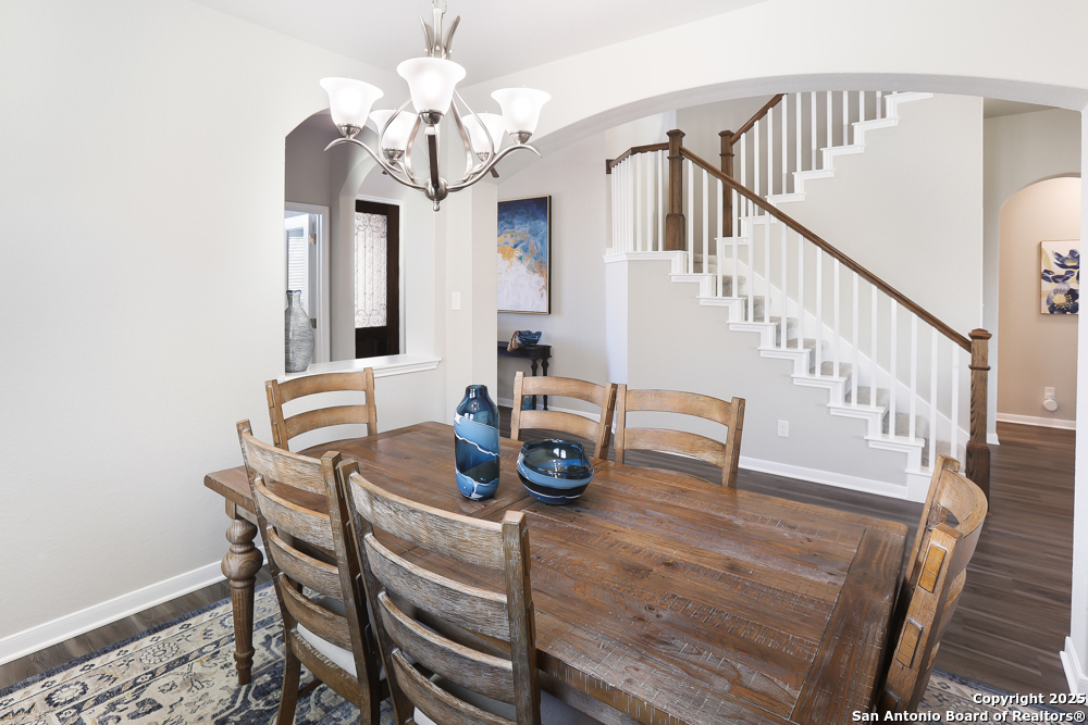 315 Canton Chase Cibolo, TX 78108 - Photo 14 of 36 a view of a dining room with furniture and a chandelier