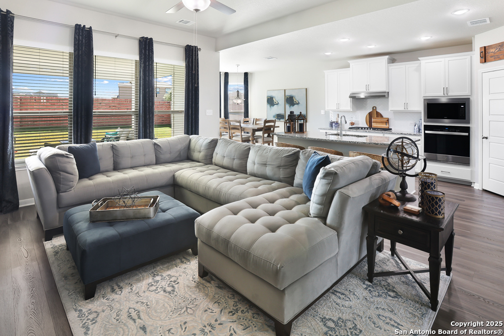 315 Canton Chase Cibolo, TX 78108 - Photo 16 of 36 a living room with furniture and a large window