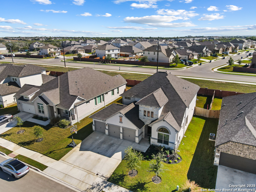 315 Canton Chase Cibolo, TX 78108 - Photo 5 of 36 an aerial view of a house with a swimming pool an outdoor seating