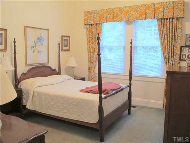 1814 Arlington Street Raleigh, NC 27608 - Photo 13 of 20 a bedroom with a bed and a window
