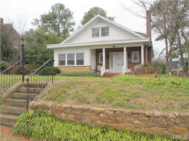 1814 Arlington Street Raleigh, NC 27608 - Photo 2 of 20 a front view of a house with a yard table and chairs