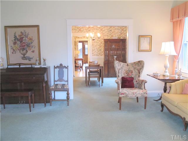 1814 Arlington Street Raleigh, NC 27608 - Photo 5 of 20 a living room with furniture and a fireplace