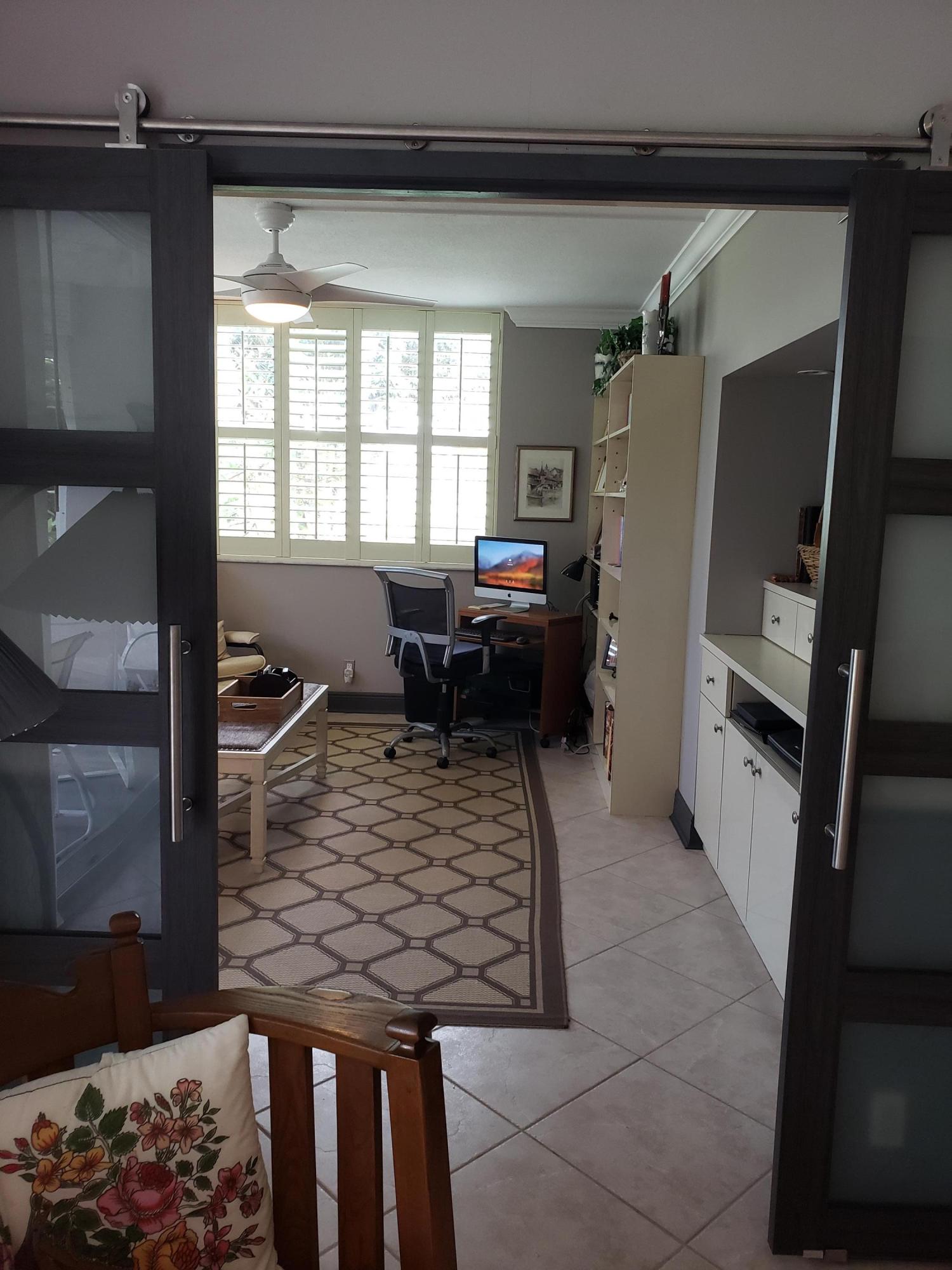 3980 Oaks Clubhouse Drive, Unit 101 Pompano Beach, FL 33069 - Photo 15 of 31 Den Study