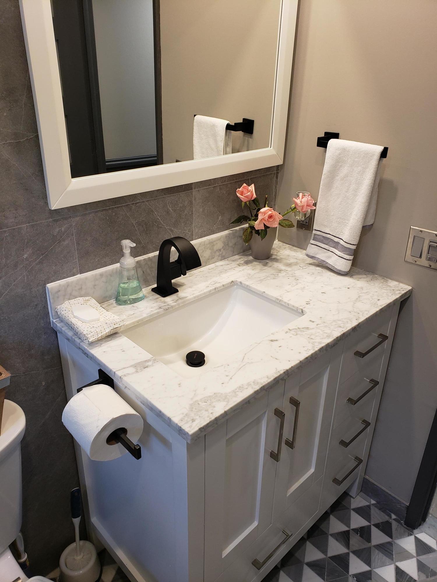 3980 Oaks Clubhouse Drive, Unit 101 Pompano Beach, FL 33069 - Photo 22 of 31 Guest Bathroom