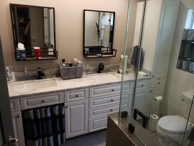 a balcony with chairs and table