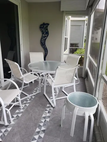 a view of yard with outdoor seating