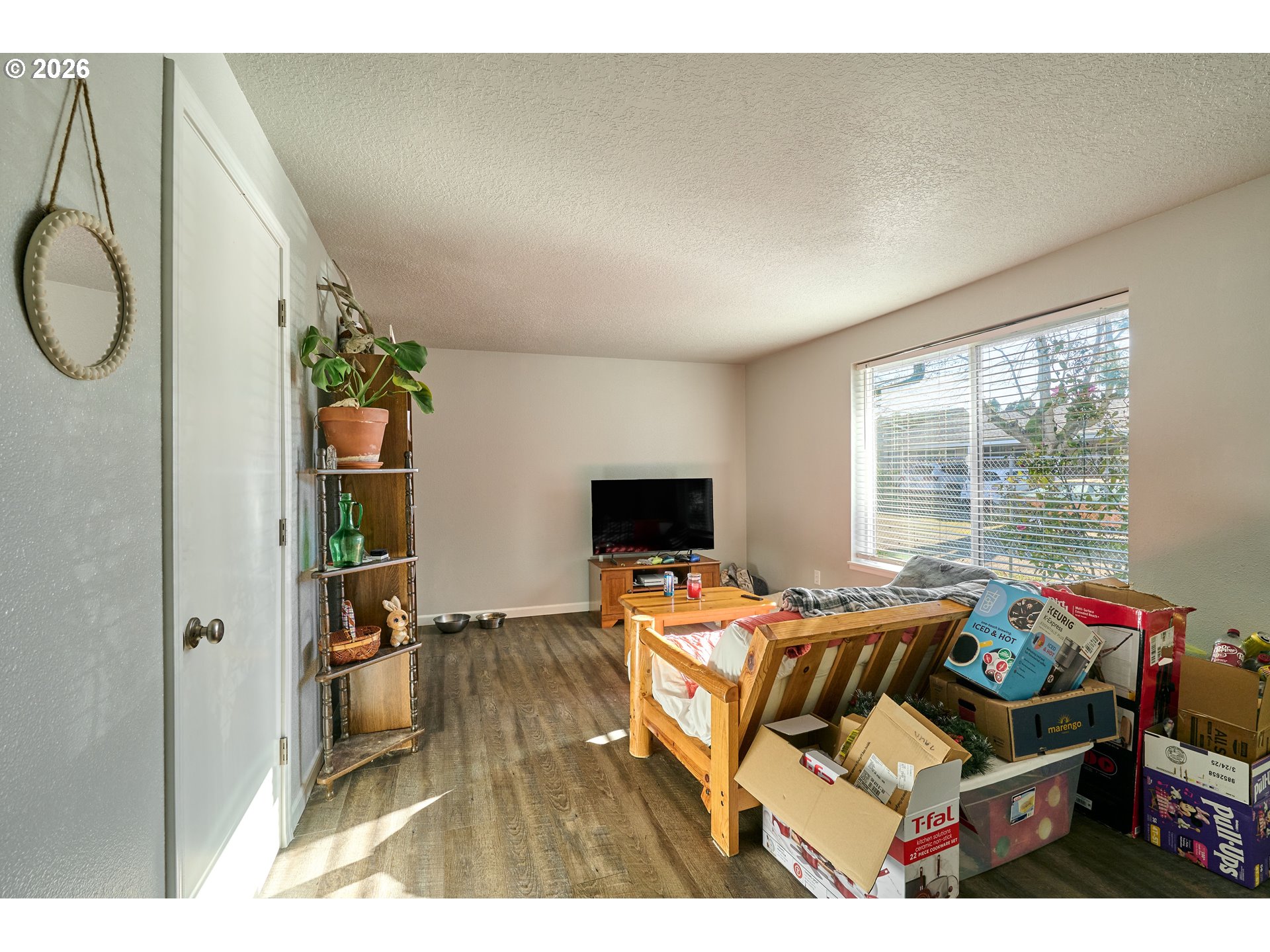 880 North Pershing Street Mount Angel, OR 97362 - Photo 18 of 30 a bedroom with a bed and large windows
