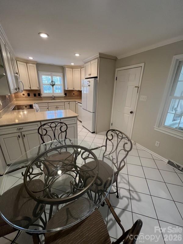 2800 Spring Valley Road Charlotte, NC 28210 - Photo 13 of 31 a room with table chairs and kitchen view
