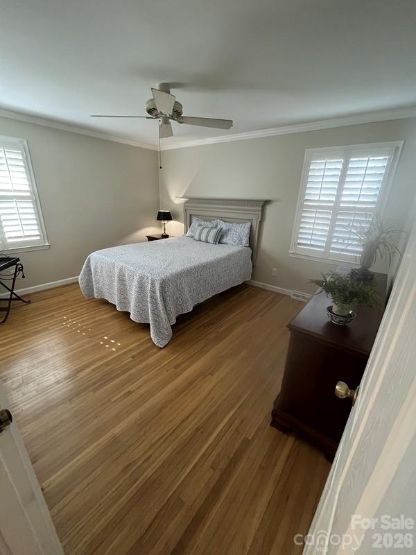 2800 Spring Valley Road Charlotte, NC 28210 - Photo 15 of 31 a bedroom with a bed and window