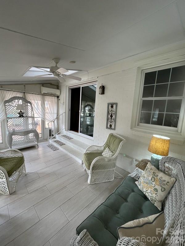 2800 Spring Valley Road Charlotte, NC 28210 - Photo 24 of 31 a living room with furniture and a window