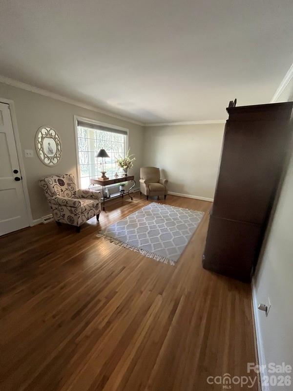 2800 Spring Valley Road Charlotte, NC 28210 - Photo 3 of 31 a living room with furniture and a wooden floor
