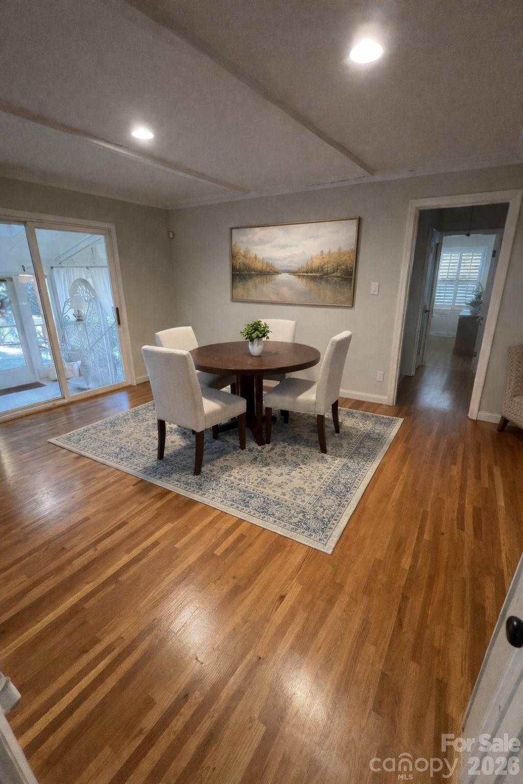2800 Spring Valley Road Charlotte, NC 28210 - Photo 10 of 31 a view of a sitting area with furniture and wooden floor