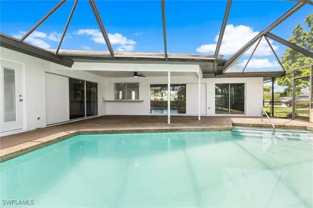 a view of a house with a swimming pool