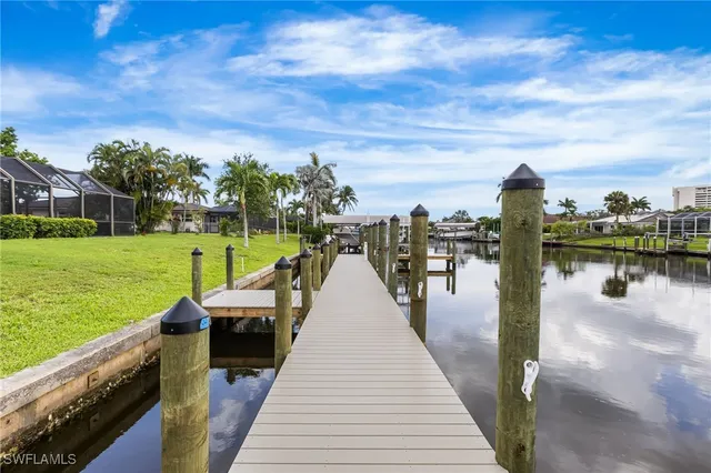a view of a lake with a large trees