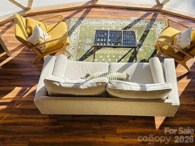 a view of swimming pool with a couch