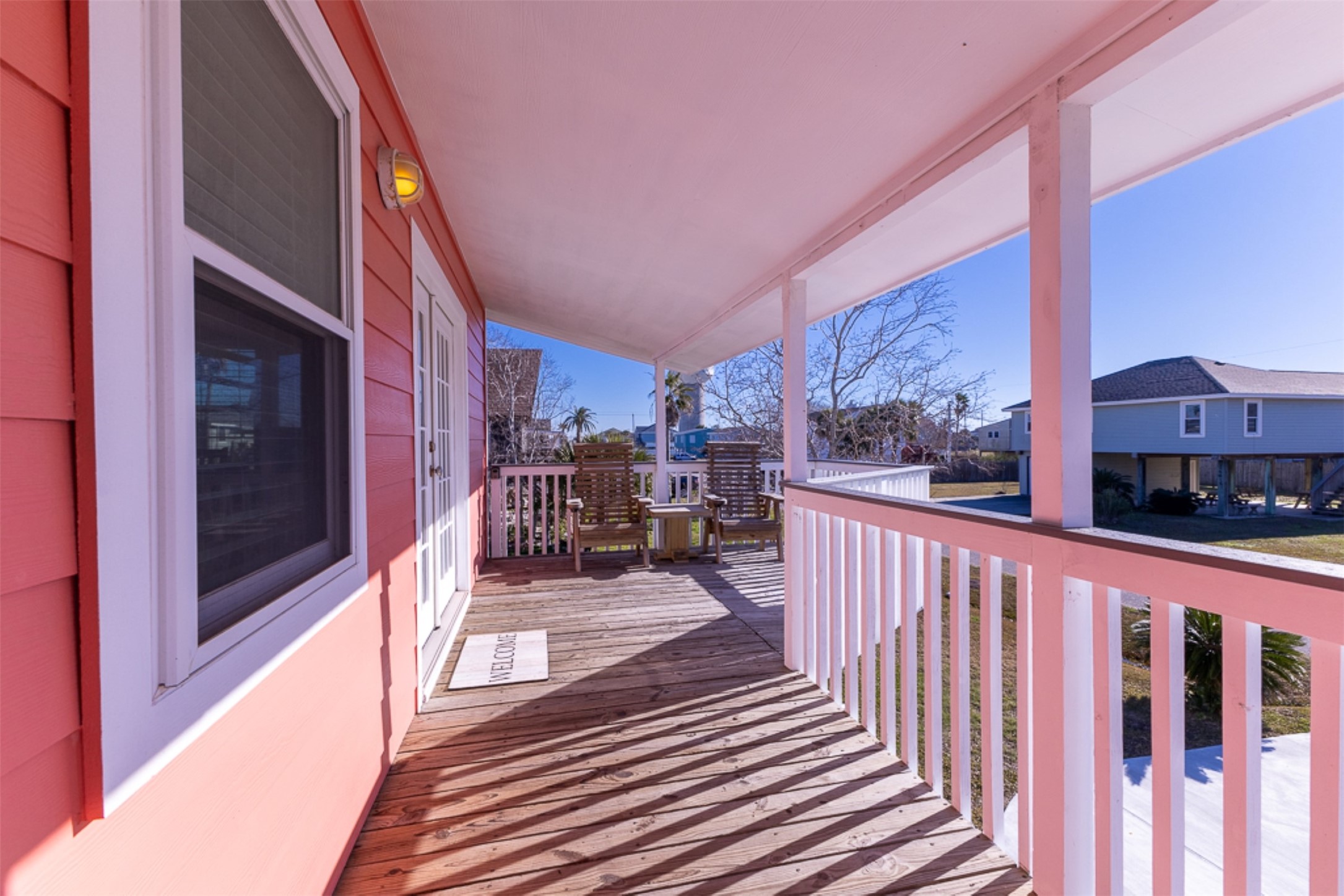 16618 Jean Lafitte Road Jamaica Beach, TX 77554 - Photo 30 of 47 a view of a balcony with car parked