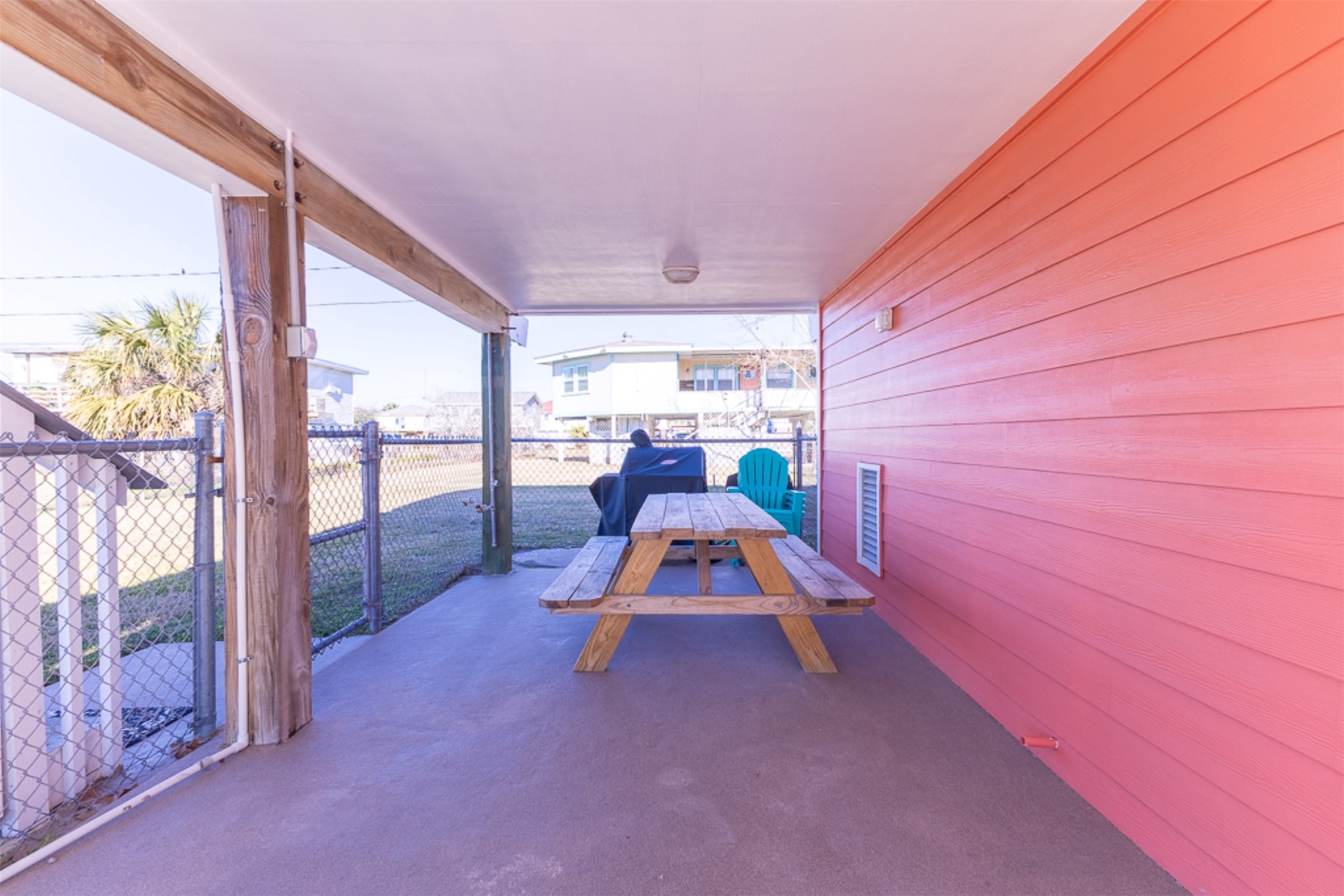 16618 Jean Lafitte Road Jamaica Beach, TX 77554 - Photo 34 of 47 a view of a room with wooden floor and iron stairs