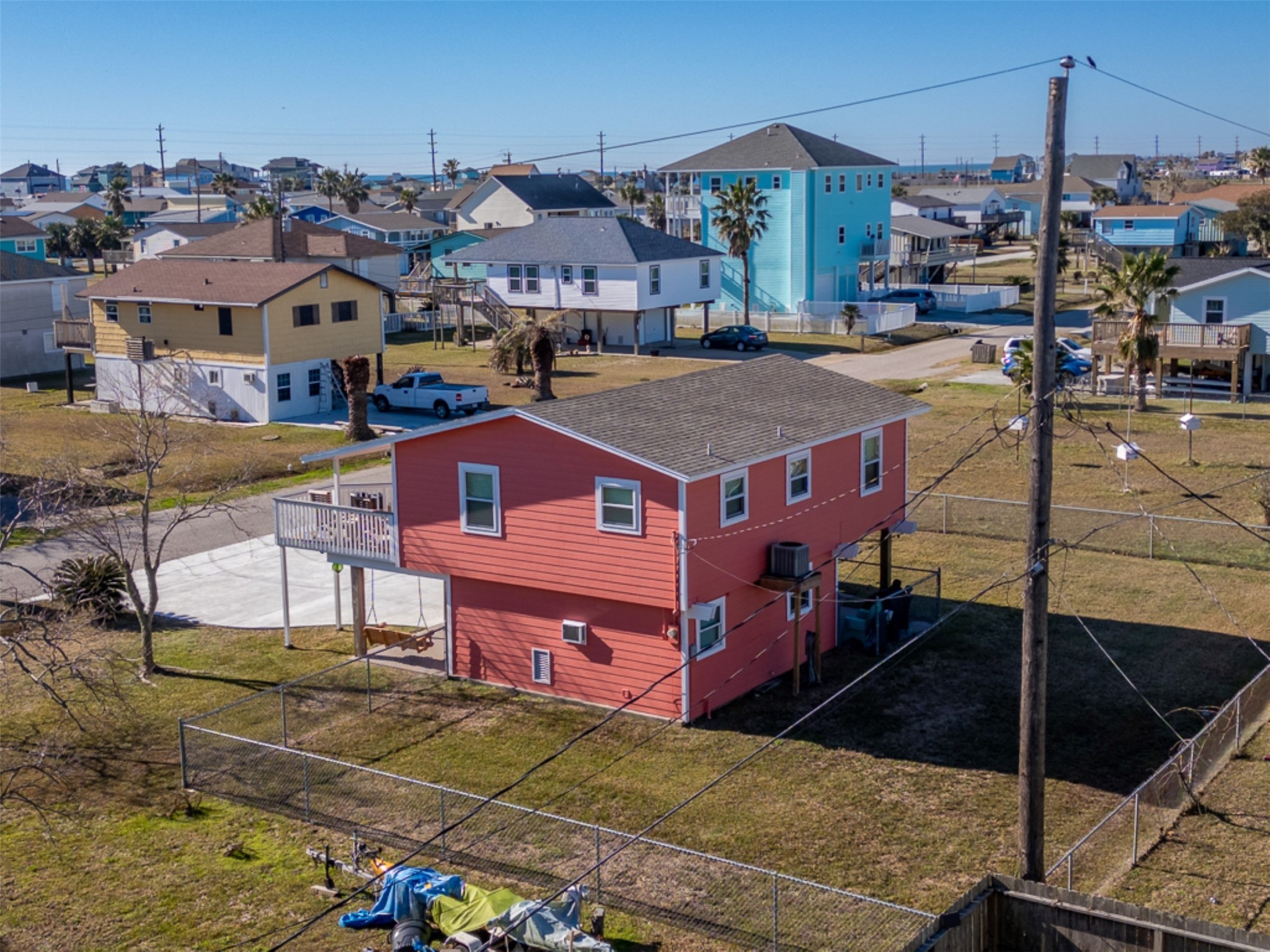 16618 Jean Lafitte Road Jamaica Beach, TX 77554 - Photo 7 of 47 a view of a town with large building