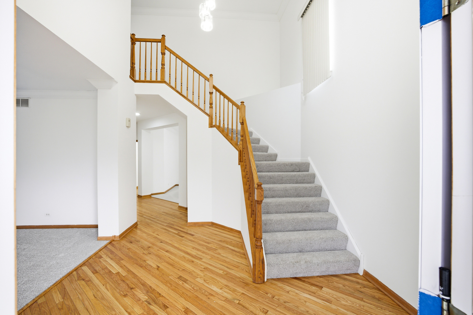 2812 Stuart Kaplan Court Aurora, IL 60503 - Photo 14 of 34 a view of entryway and hall with wooden floor