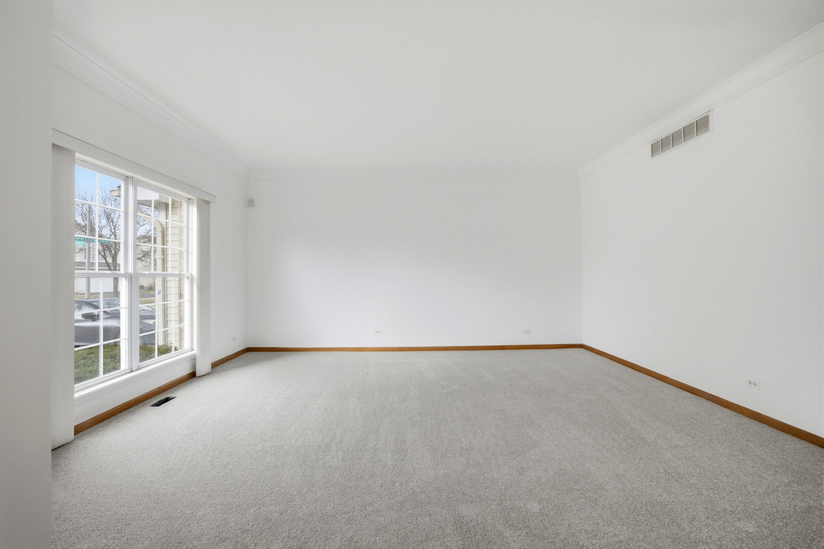 2812 Stuart Kaplan Court Aurora, IL 60503 - Photo 26 of 34 a view of an empty room with a window