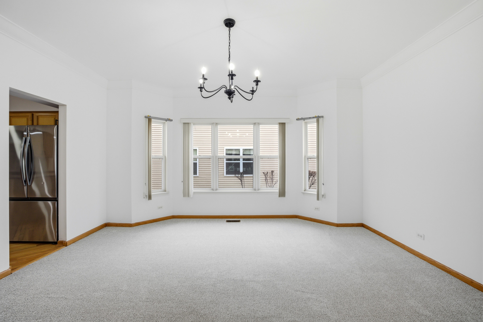 2812 Stuart Kaplan Court Aurora, IL 60503 - Photo 27 of 34 a view of an empty room with a window