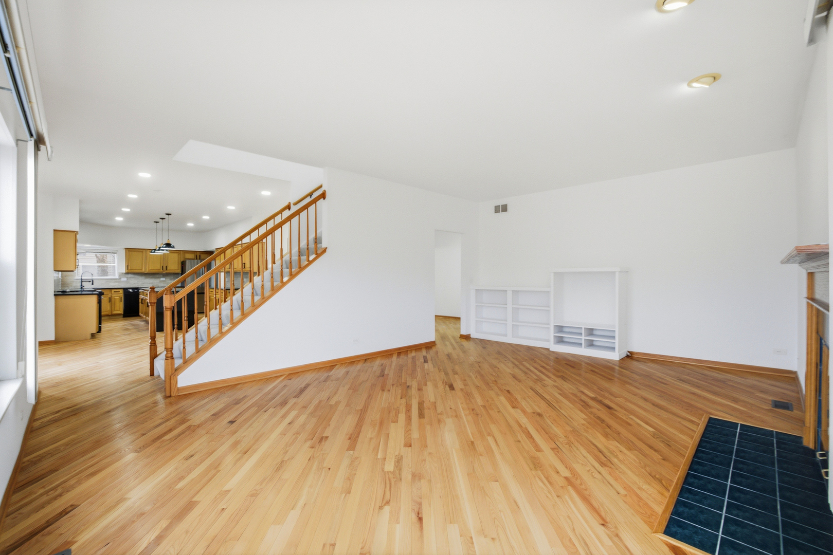 2812 Stuart Kaplan Court Aurora, IL 60503 - Photo 4 of 34 a view of an empty room with wooden floor