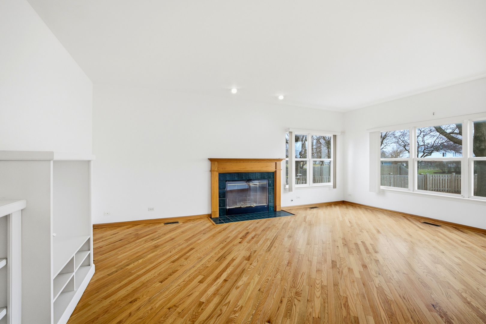 2812 Stuart Kaplan Court Aurora, IL 60503 - Photo 10 of 34 a view of an empty room with a window and fire place
