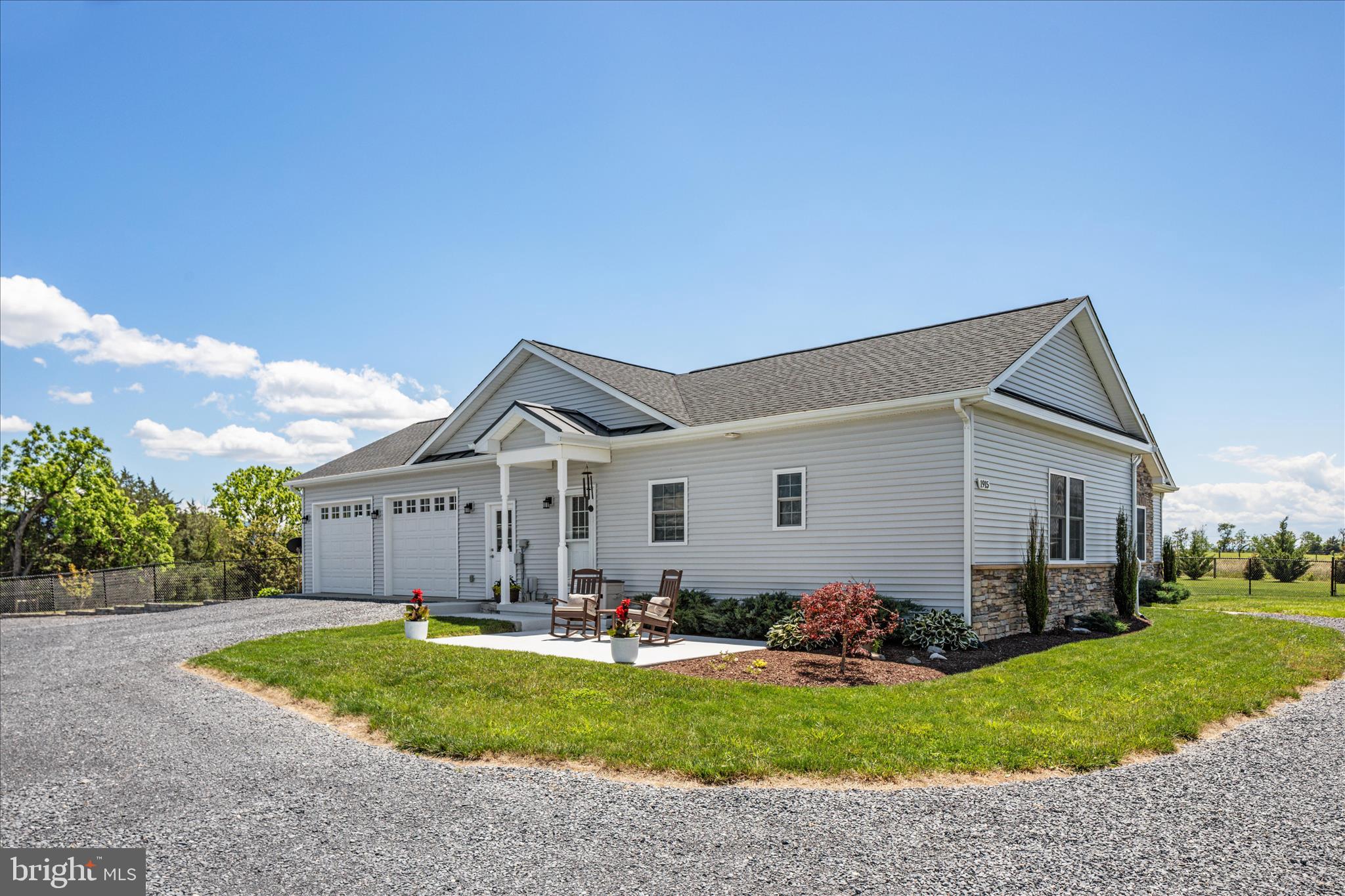 1915 Polk Road Edinburg, VA 22824 - Photo 53 of 83 Side View of Attached Garages & Entryway of Home