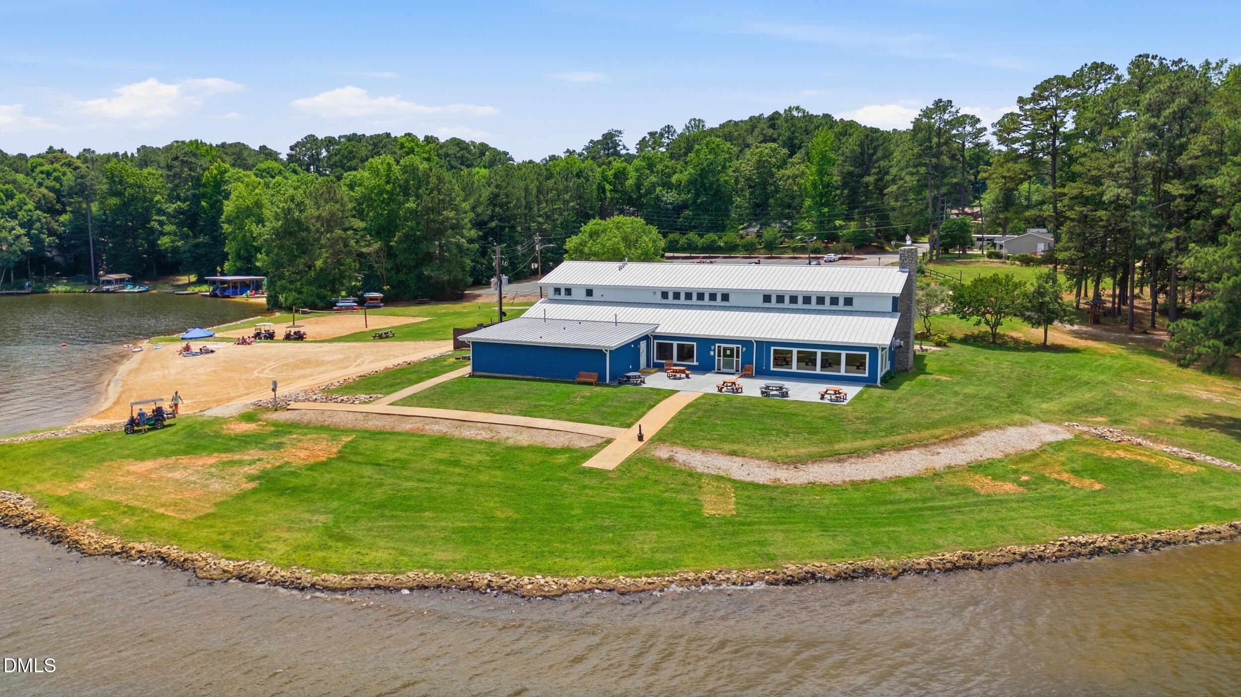 129 Shaman Drive Spring Hope, NC 27882 - Photo 36 of 43 a view of a house with pool and a yard