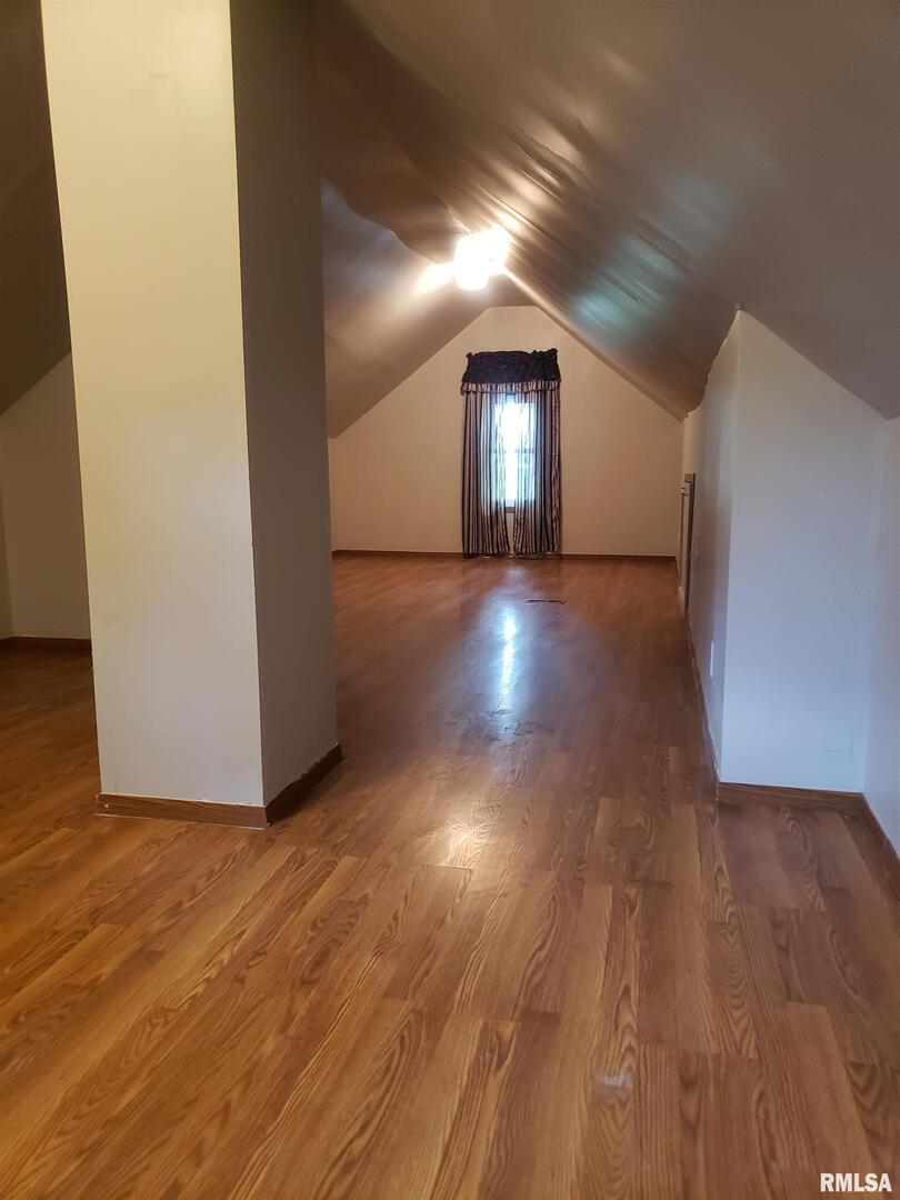 212 44th Street Moline, IL 61265 - Photo 13 of 23 a view of wooden floor and windows in a room