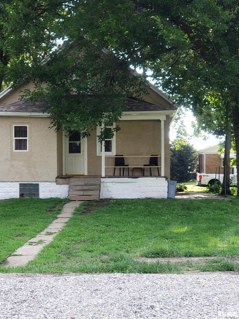 212 44th Street Moline, IL 61265 - Photo 21 of 23 a view of a house with a backyard