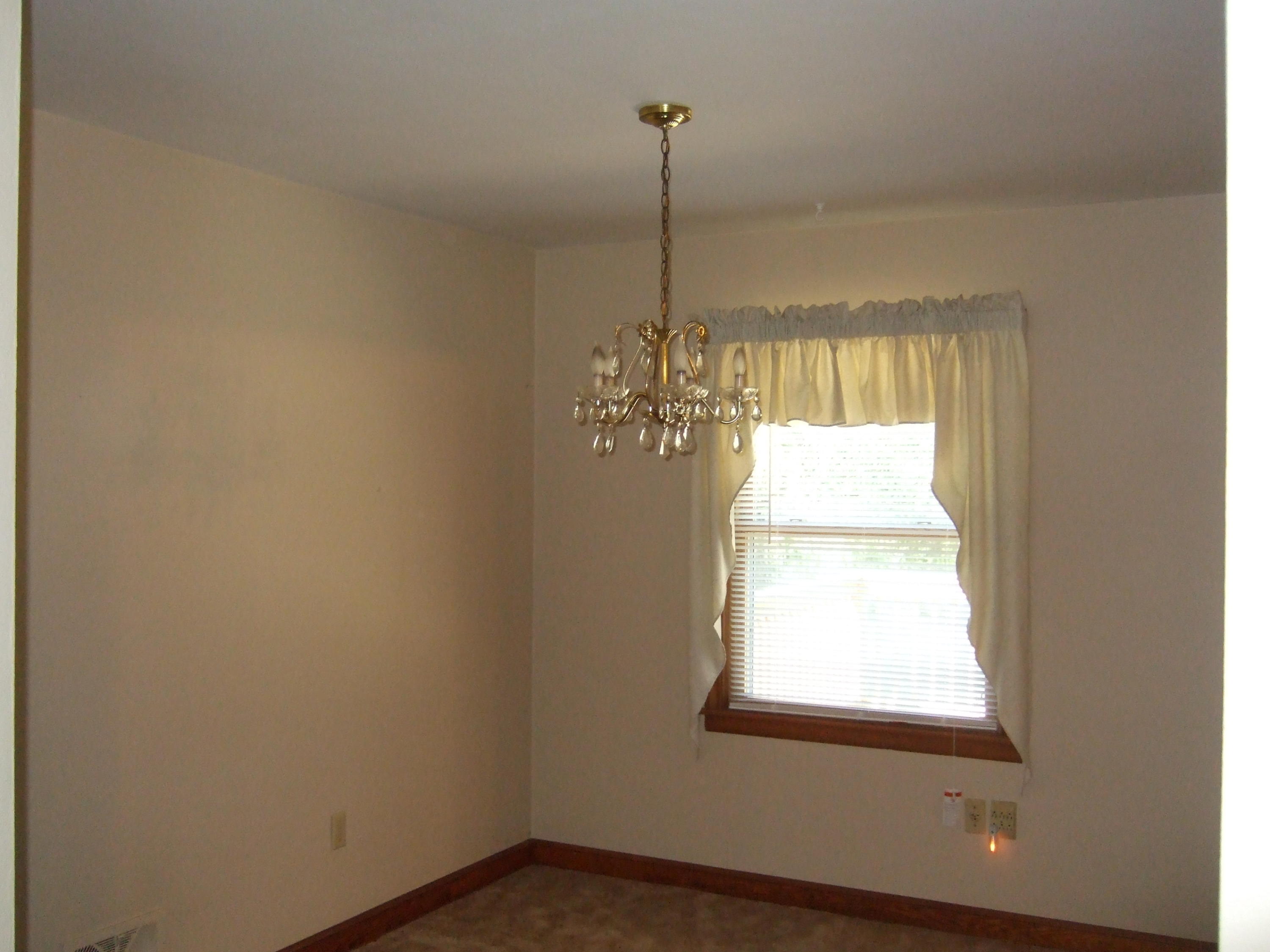 2752 Green Ridge Road Roanoke, VA 24019 - Photo 5 of 17 a view of a room with a window and chandelier