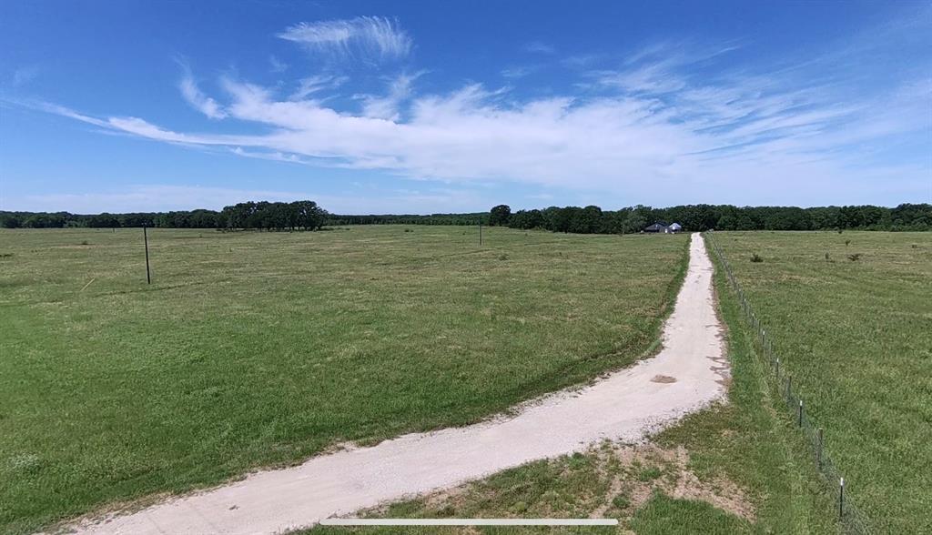 1411 Rains County Road 2610 Alba, TX 75410 - Photo 17 of 25 a view of a lake with a lake