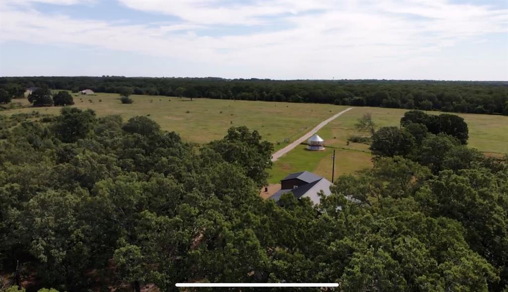 1411 Rains County Road 2610 Alba, TX 75410 - Photo 20 of 25 a view of a lake with a mountain view